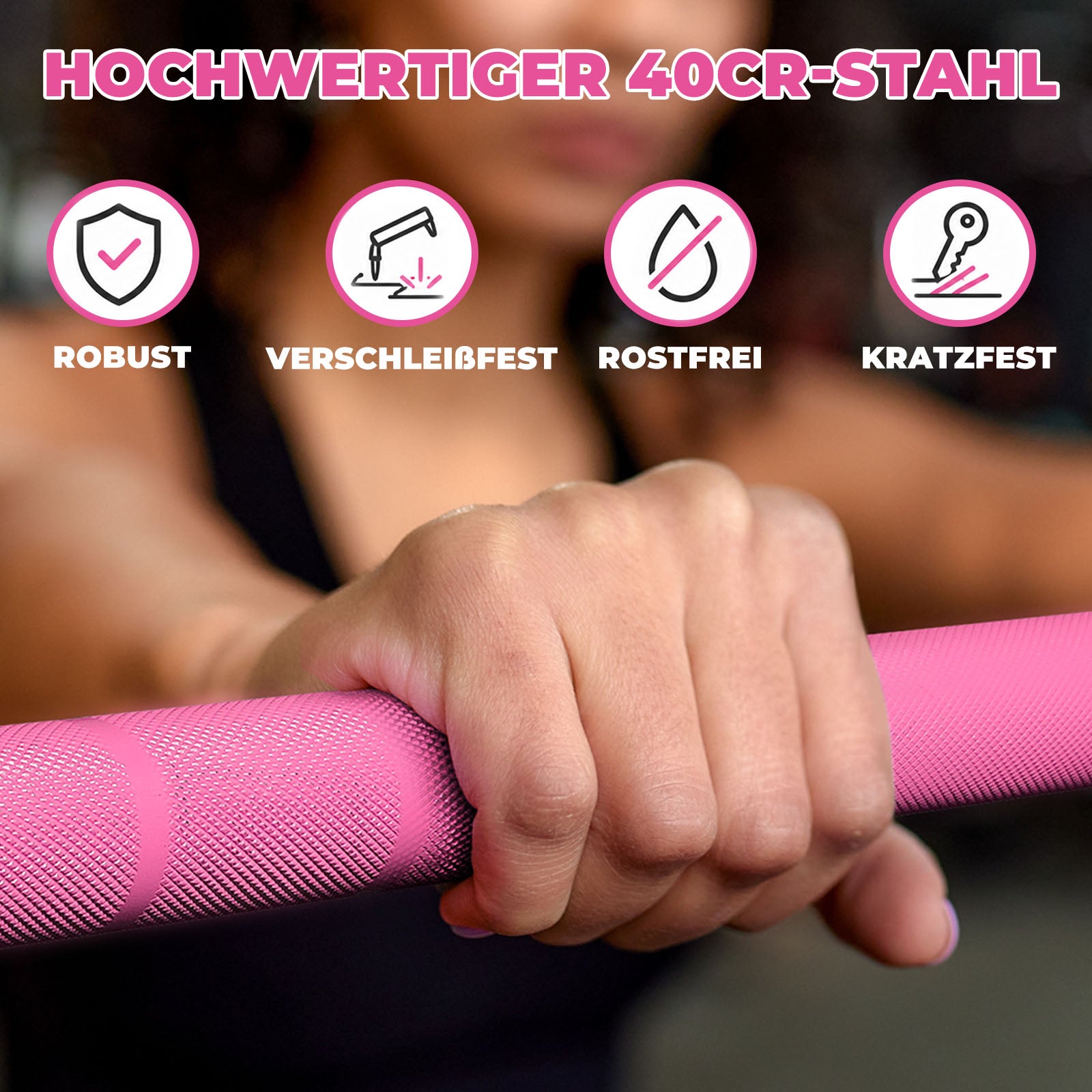 Hand greift pinke RitFit Trainings-Langhantel mit geriffelter Oberfläche